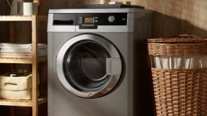 A silver washing machine that needs washing machine maintenance